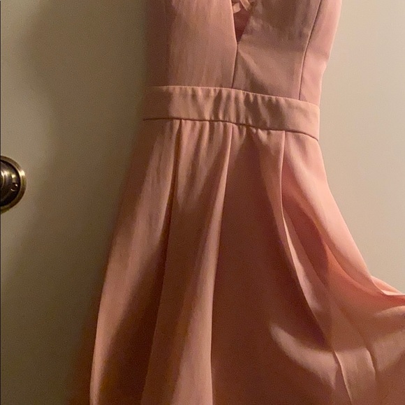soft pink romper with crisscross in front - Picture 2 of 3